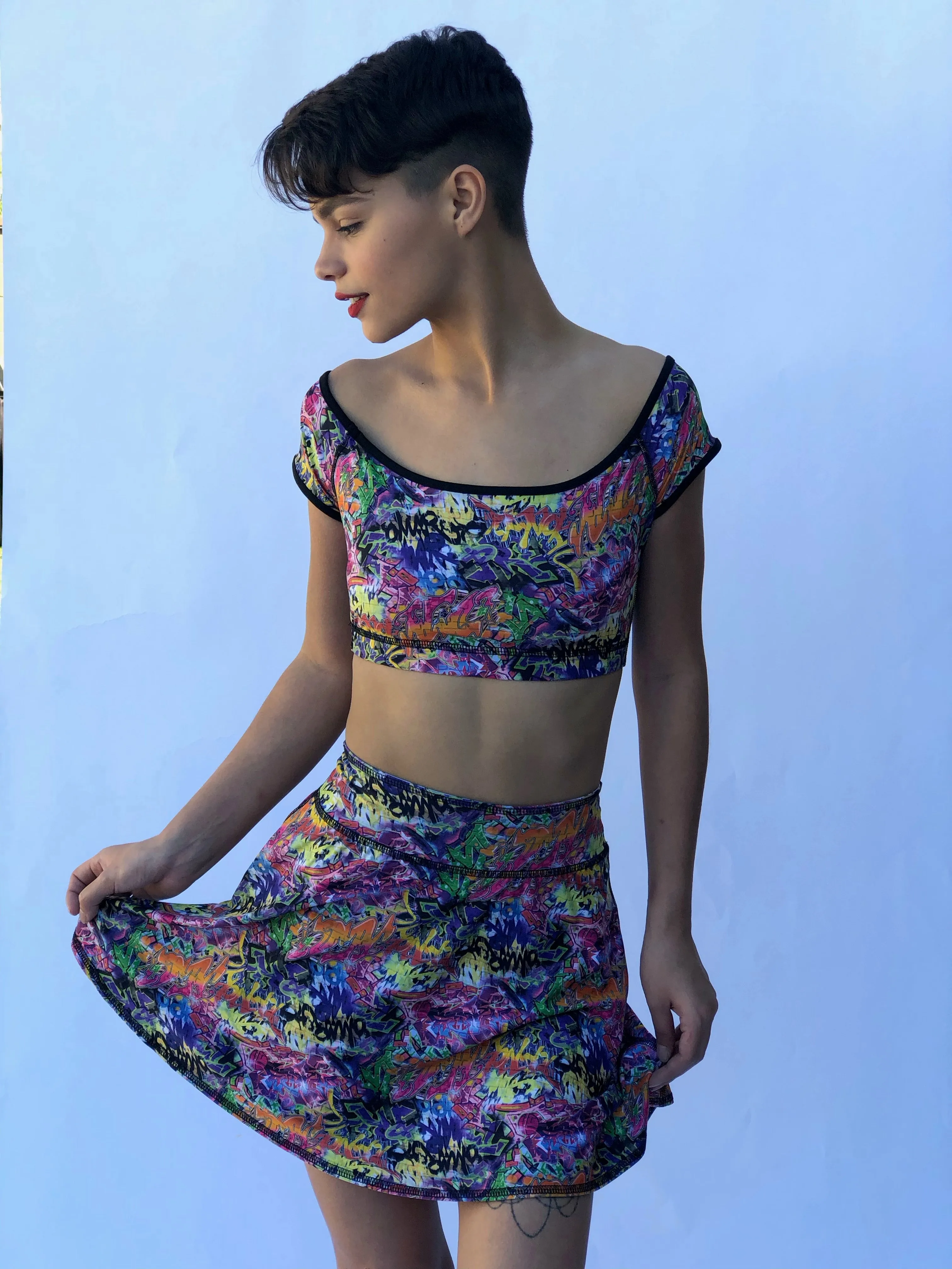 OFF THE SHOULDER CROP TOP GRAFFITI/BUNS OF STEEL