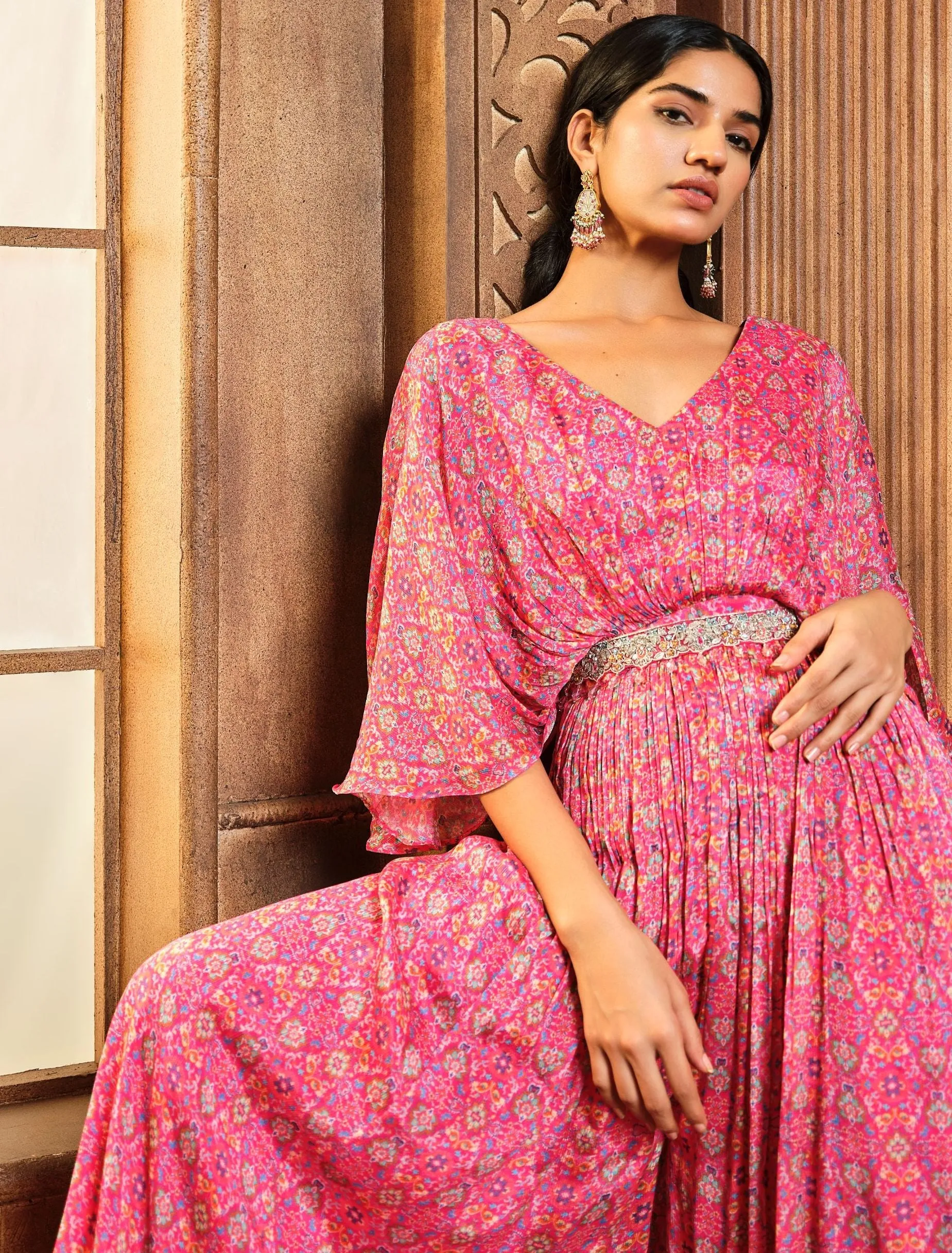 Pink persian printed flared jumpsuit with belt